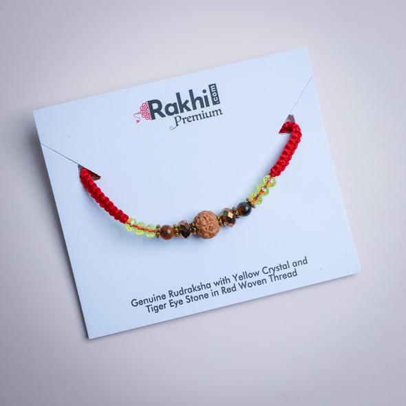Premium Rudraksha with Yellow Crystal and Tiger Eye Stone in Red Woven Thread