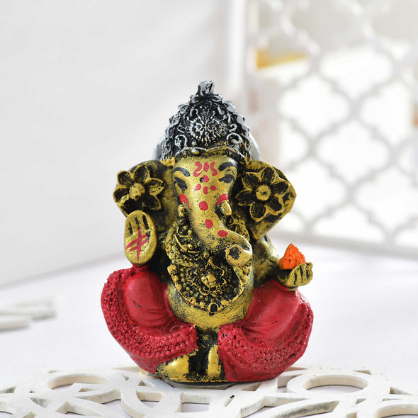 Single Rudraksha Rakhi With Ganesha Idol & Rocher