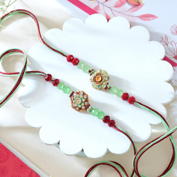 Set of 2 Rakhi With Besan Laddoo & Snickers