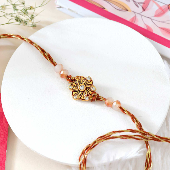 Golden Floral Rakhi With Cashew Almond - UK