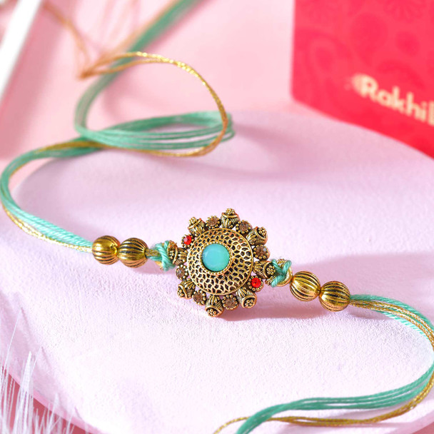 Regal Mint Mandala Rakhi With Sweet Dryfruits Hamper
