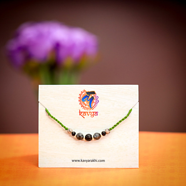 Black Stone Beaded Rakhi with Green Thread