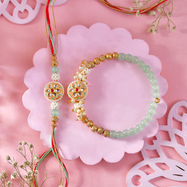 Elegant Bhaiya-Bhabhi Rakhi Set with Rasgulla & Dryfruits
