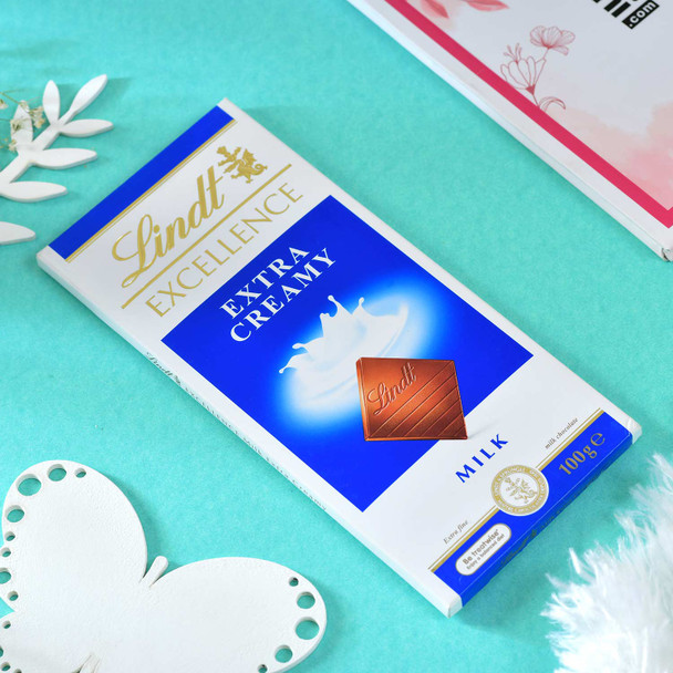 Blue Rangoli Rakhi With Lindt Chocolate Bar