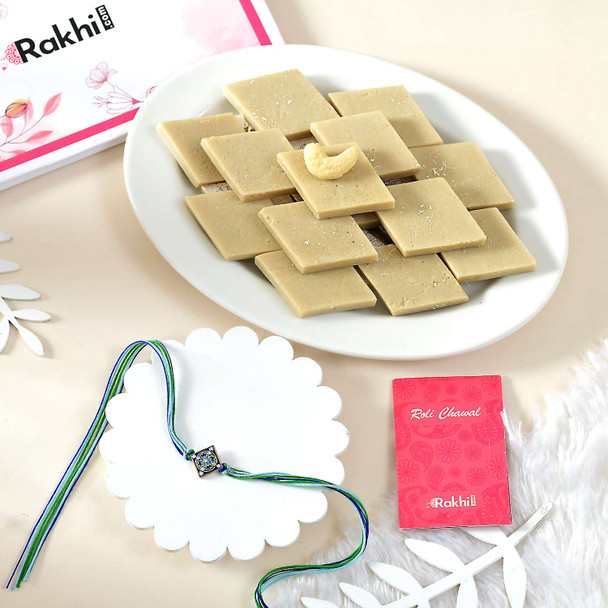 Simple Blue Rangoli Rakhi With Kaju Katli