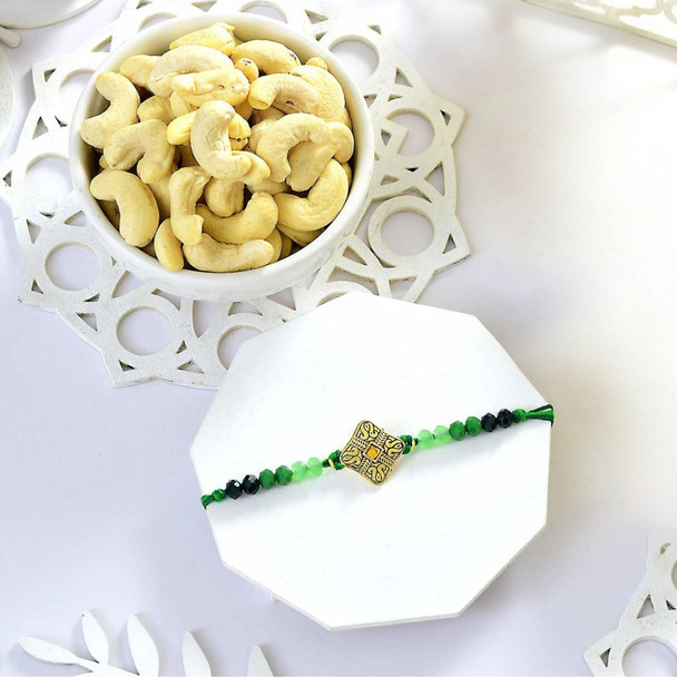 Elegant Beaded Rakhi with Green Thread With Cashew