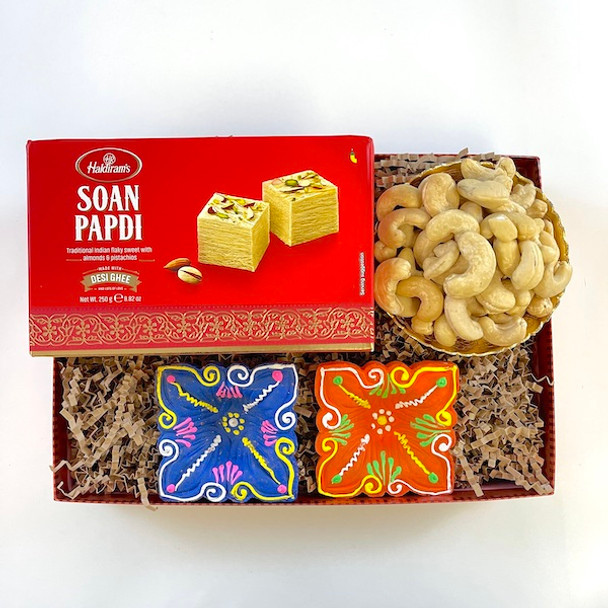Sweets Nuts & Diyas For Diwali Celebration