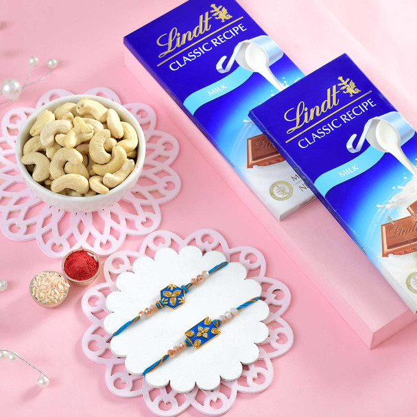 Two Ethnic Royal Blue Rakhi Choco Nut Hamper