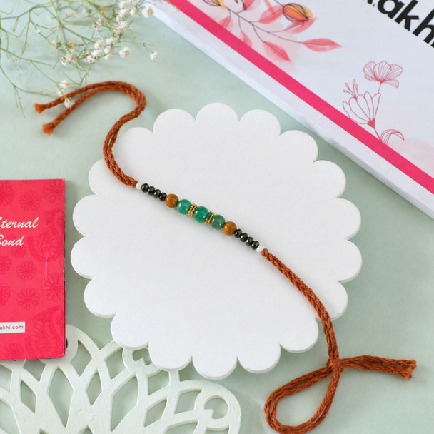 Green Moti Rakhi with Dairy Milk Chocolates