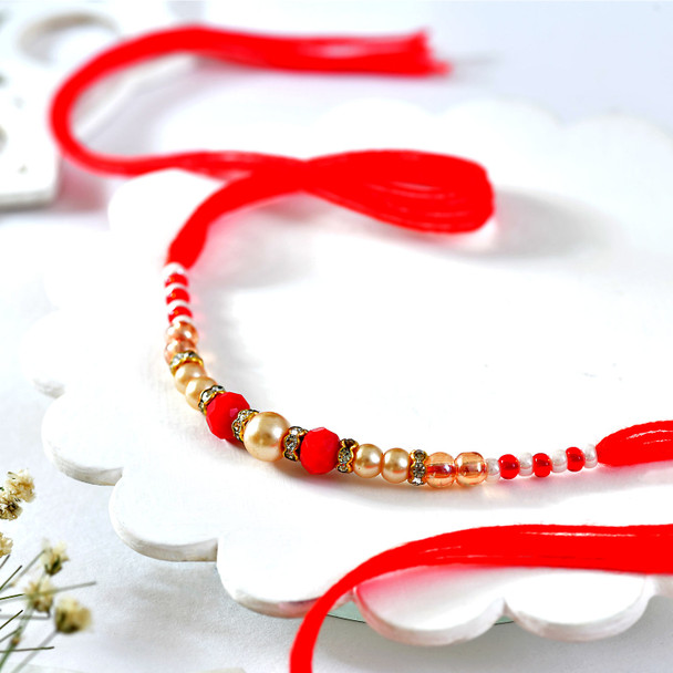 Elegant Pearl & Crimson Beaded Rakhi for Brother