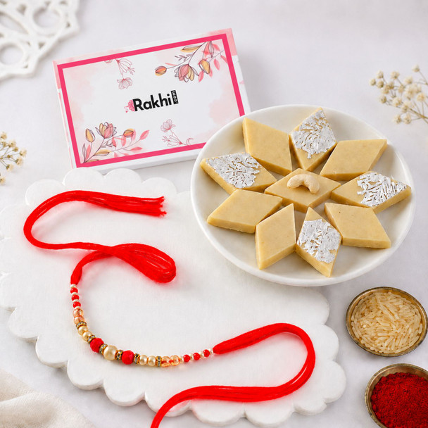 Elegant Pearl & Crimson Beaded Rakhi with Kaju katli