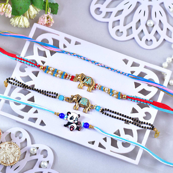 Pack of 4 Designer Rakhis with Baklawa Sweet