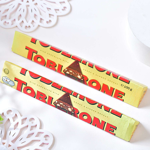 Twin Rakhis with Toblerone Delight