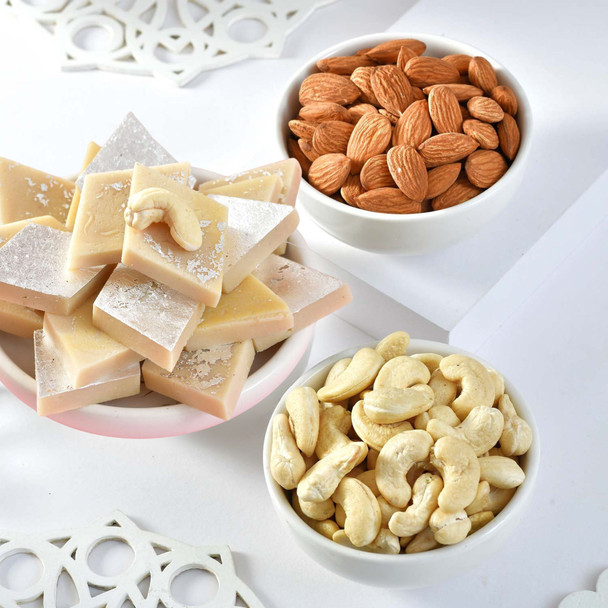 Elegant Rakhi Trio with Gourmet Treats