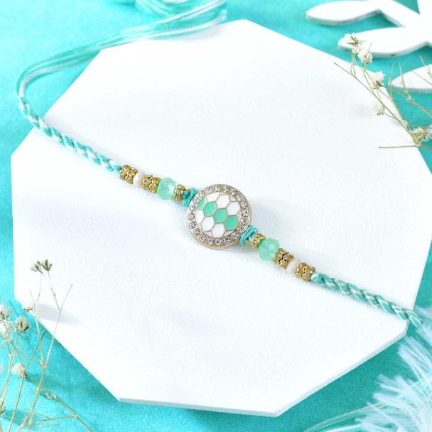 Turquoise Designer Rakhi With Kaju Katli And Ferrero Rocher