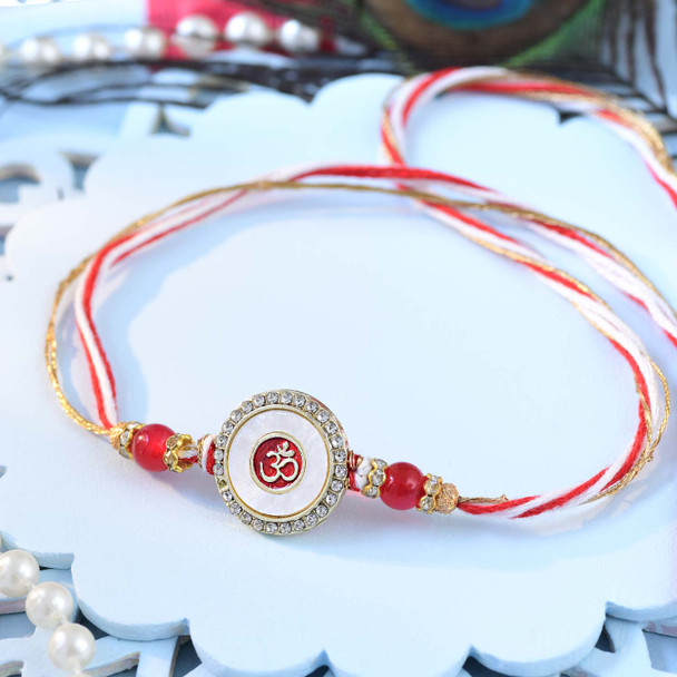 Om Grace Rakhi with Sweets and Dry Fruits