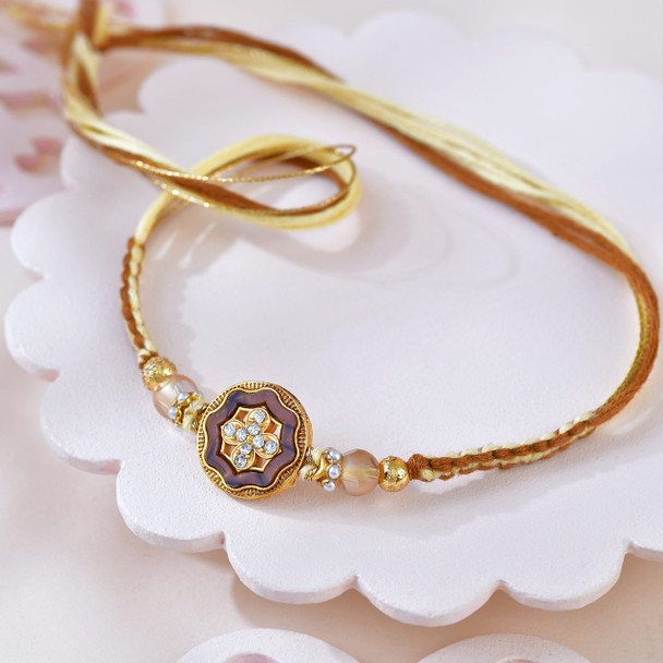 Rose Gold Flower Rakhi With Kaju Katli