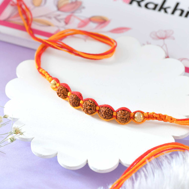 Saffron Rudraksh Rakhi With Kaju Katli