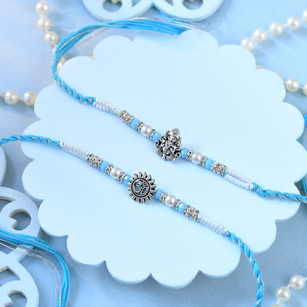 Ganesha & Om Rakhi Premium Sweet with Rocher Gift Combo