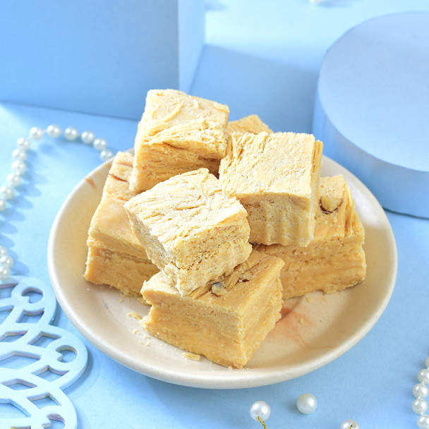 Divine Om Rakhi Sweet with Nut Combo