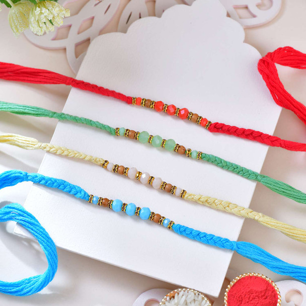 4 Hand Braided Colored Rakhi Set With Kaju Katli Sweet