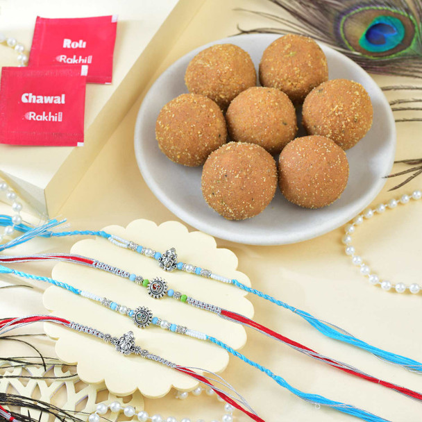Set Of Four Religious Rakhi With Besan Laddu