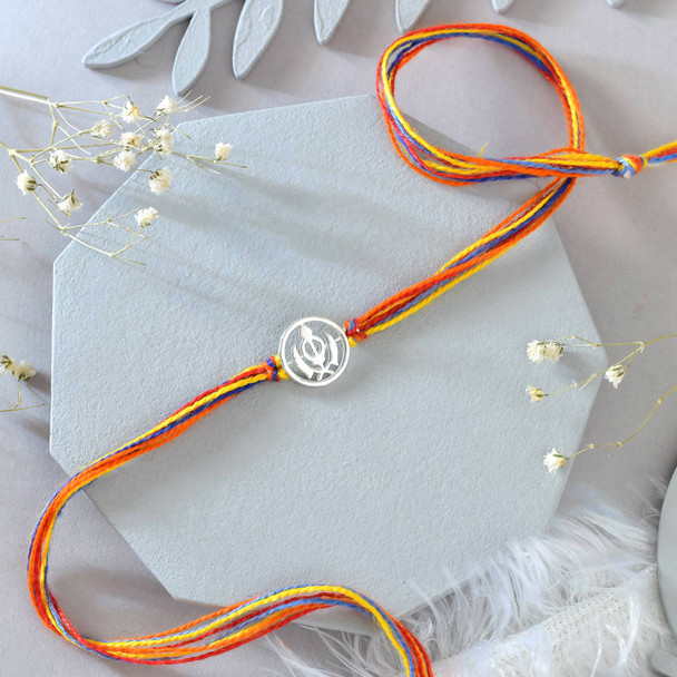 The Khanda Sahib Silver Rakhi with Kaju Katli