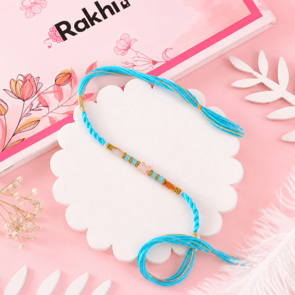 Serene Blue Rakhi with Sweets & Puja Thali Hamper