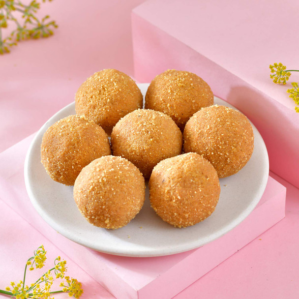 Two Fancy Rakhi with Laddoo & Ferrero Delight