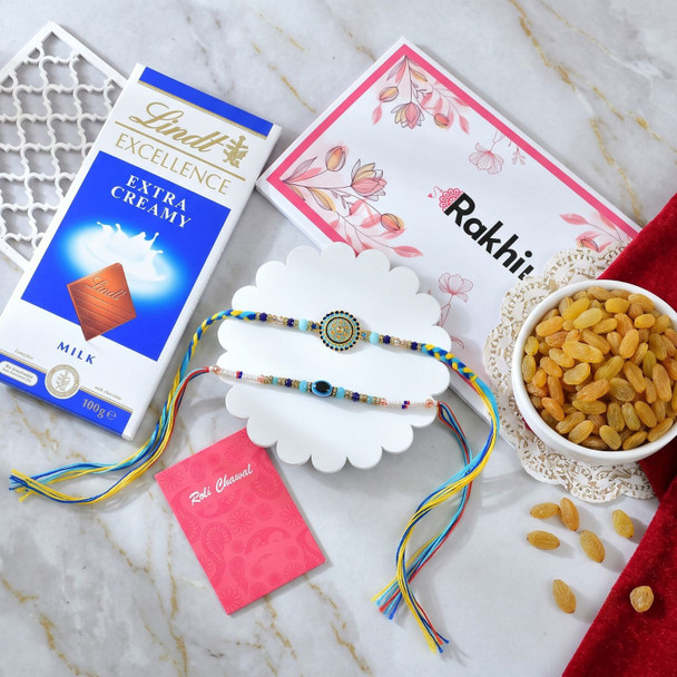 Traditional Two Blue Rakhi Lindt & Raisin Delight