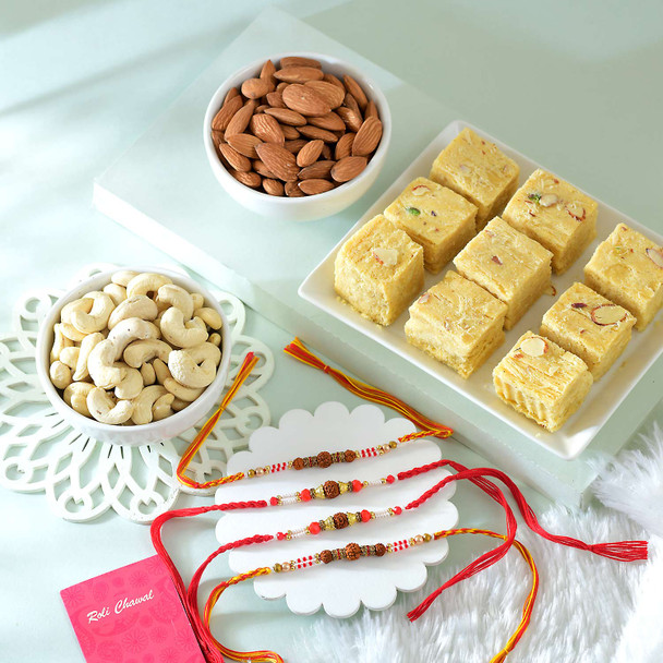 Four Rakhi set with Sweets and Dry Fruits