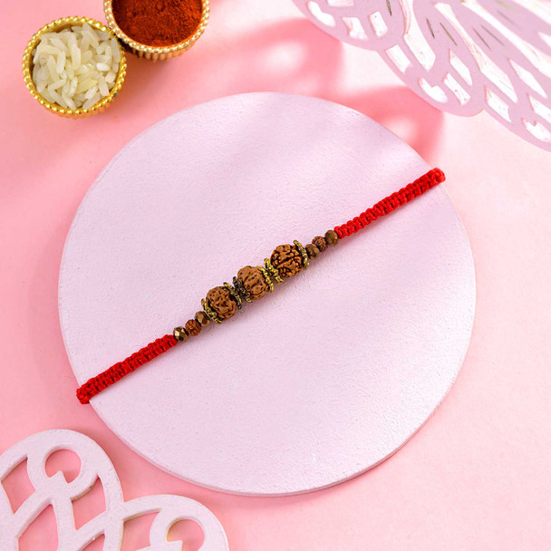 Real Rudraksha Rakhi In Red Woven Thread