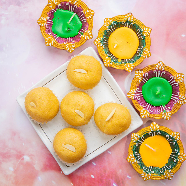 Colorful Diya Set with Besan Laddoo