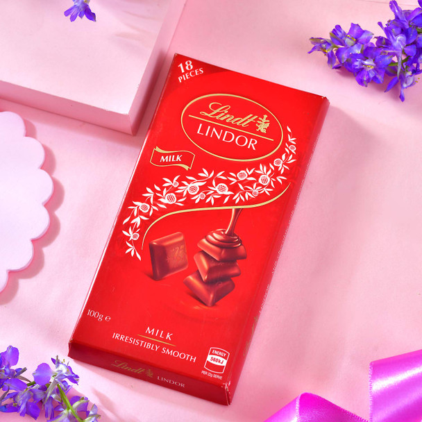 Charming Raja Rani Rakhi Choco Nut Hamper