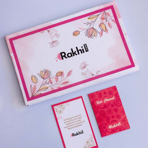 Set of 2 Floral Design Rakhis with Gourmet Hamper