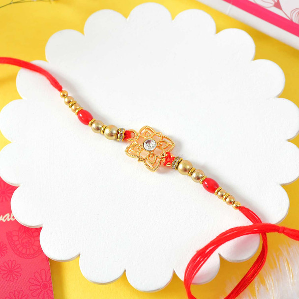 Designer Red Flower Rakhi Choco Nut Hamper
