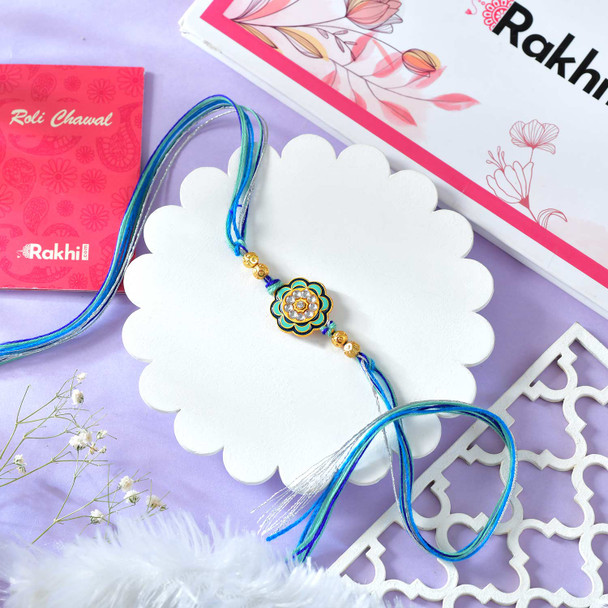 Floral Shaped Rakhi With Blue Thread