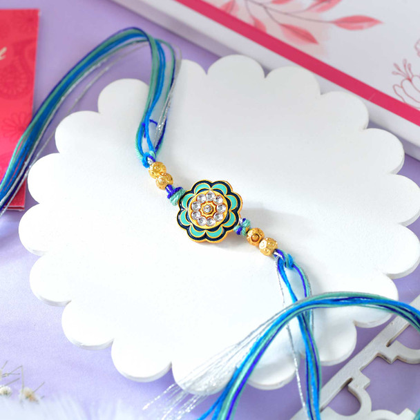 Floral Shaped Rakhi With Blue Thread