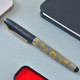 Elegant Lotus Flowers and Personalized Pen