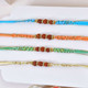 Four Vibrant Rudraksh Rakhi Set