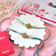 Set of 2 Rakhi With Assorted Chocolates
