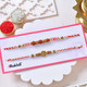Sacred Rudraksha & Spiral Charm Rakhi Set