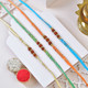 Set of 4 Colorful Rudraksha Rakhi Collection with Kaju Katli