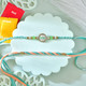 Designer Rakhi Set with Besan Laddoo & Ferrero Rocher