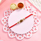 Rudraksha Rakhi & Kaju Katli Sweet
