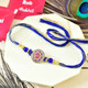 Sacred Om Rakhi Duo