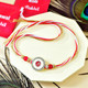 Sacred Om Rakhi Duo