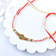 Elegant Antique Gold Charm Rakhi