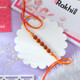 Saffron Rudraksh Rakhi With Kaju Katli