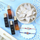 Divine Om Rakhi with Sweets & Fragrance Combo